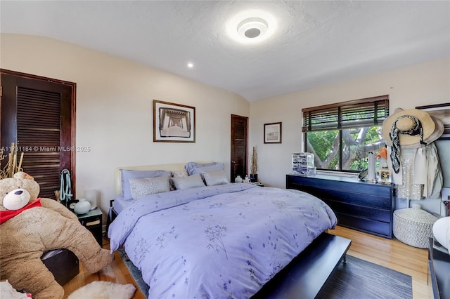 bedroom featuring wood finished floors