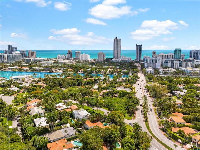 aerial view with a water view and a city view