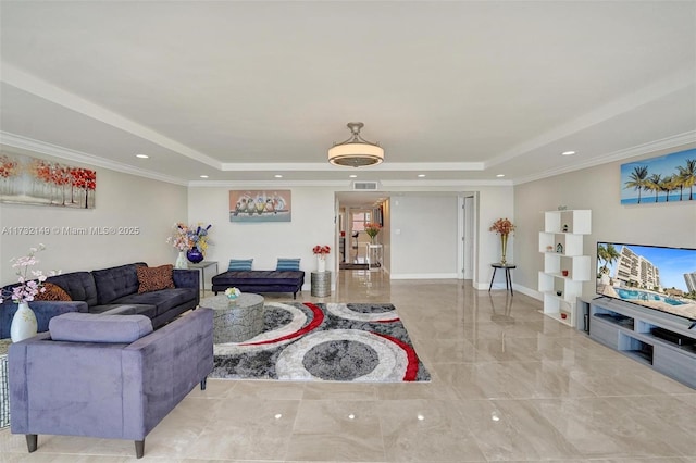 living room featuring recessed lighting, a tray ceiling, and ornamental molding