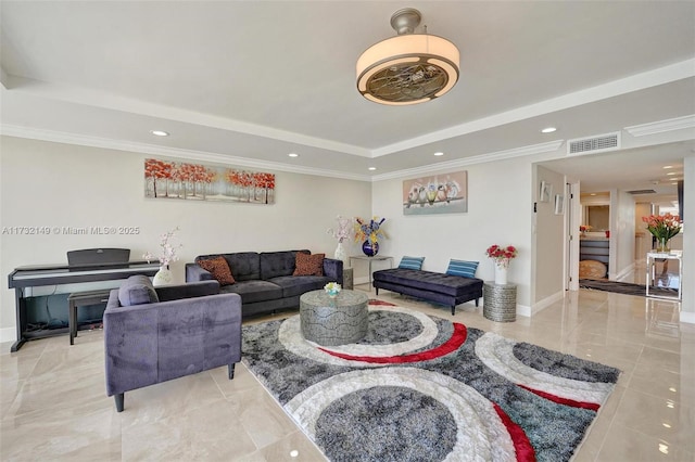 living room featuring baseboards, visible vents, ornamental molding, a tray ceiling, and recessed lighting