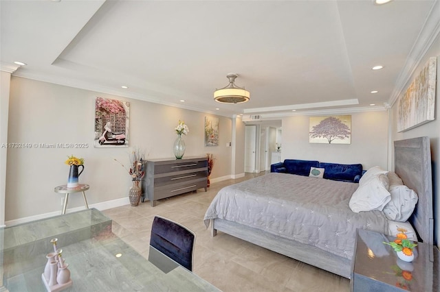 bedroom featuring baseboards, a tray ceiling, and crown molding