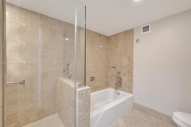 bathroom featuring visible vents, a shower stall, toilet, and a bath