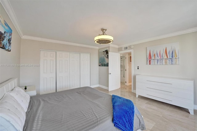 bedroom with ornamental molding, a closet, and baseboards