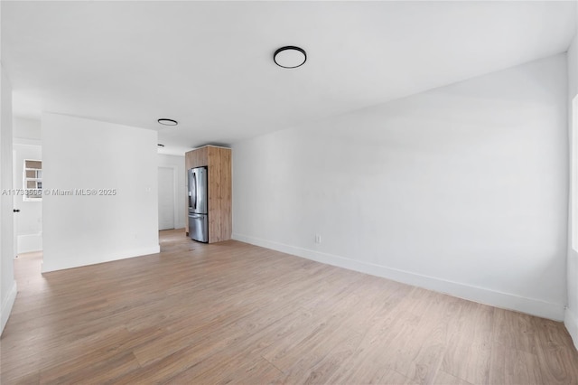 empty room featuring light wood-type flooring