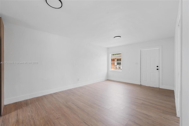 unfurnished room featuring light hardwood / wood-style flooring