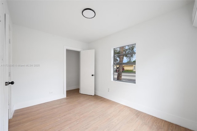 unfurnished bedroom with light hardwood / wood-style floors