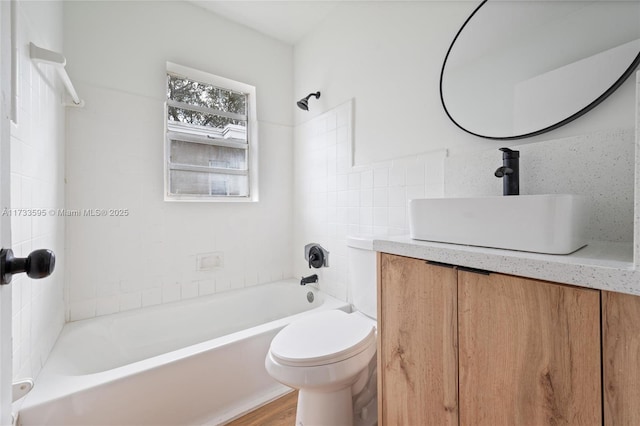 full bathroom with wood-type flooring, decorative backsplash, vanity,  shower combination, and toilet