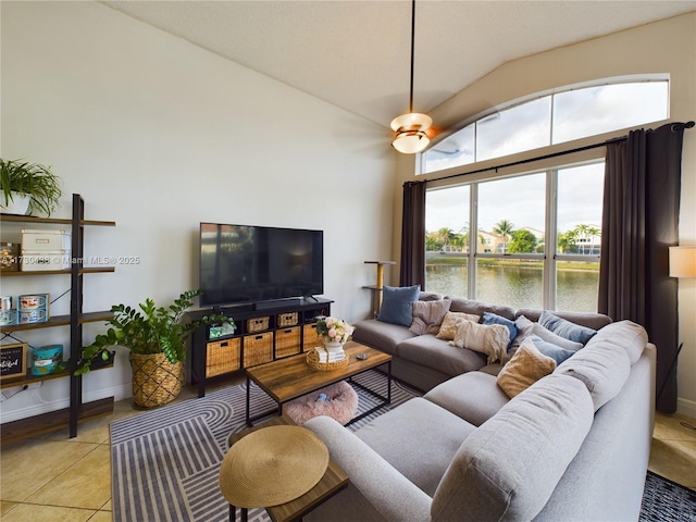 tiled living room with lofted ceiling