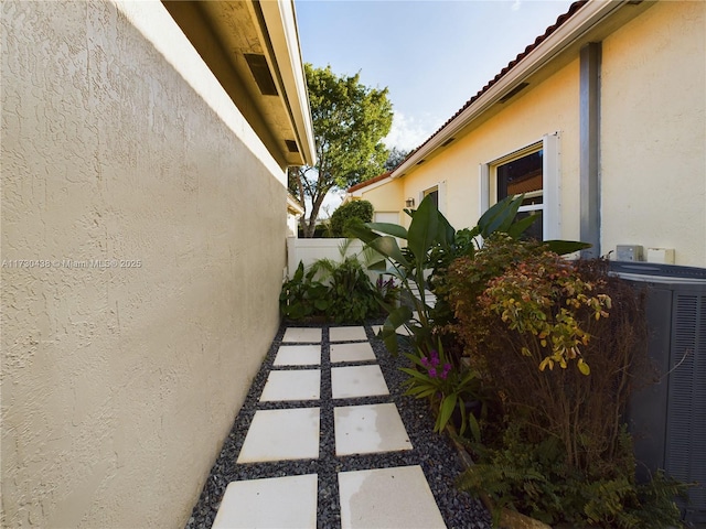 view of home's exterior featuring central AC unit