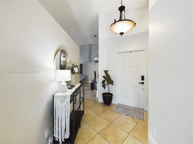 foyer featuring light tile patterned floors