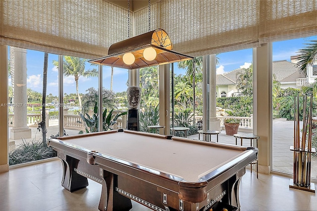 playroom featuring plenty of natural light and pool table