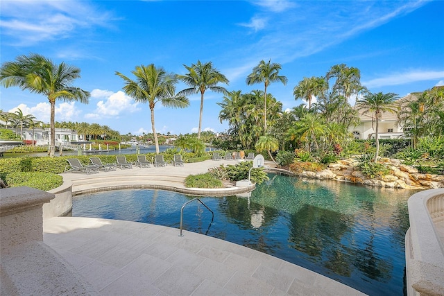 view of swimming pool with a patio area