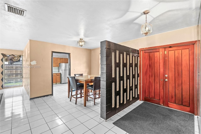 view of tiled foyer