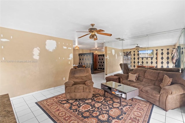 tiled living room featuring ceiling fan