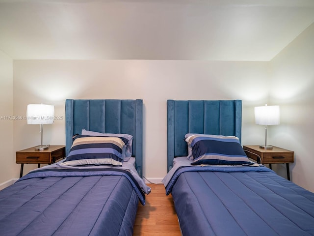 bedroom featuring hardwood / wood-style flooring