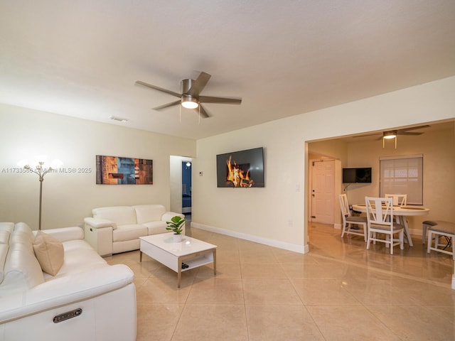 living room with ceiling fan