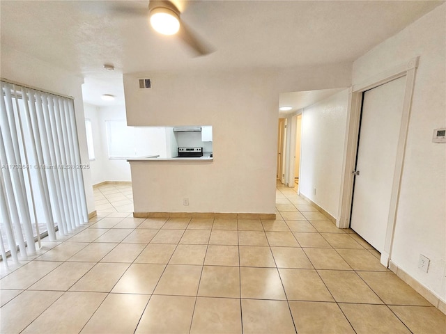 5740 Rock Island Rd Unit 274, Tamarac, FL 33319 - unfurnished living room featuring light tile patterned floors, ceiling fan, and visible vents