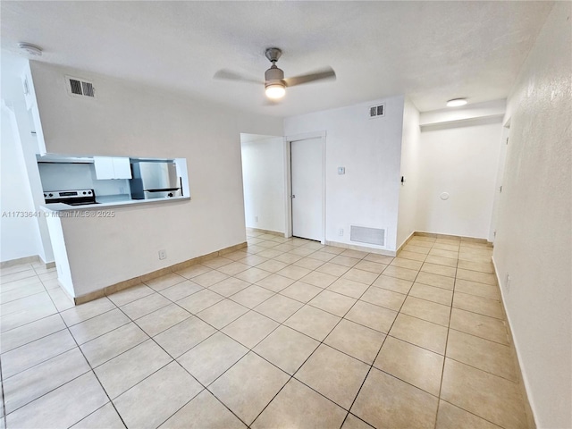 5740 Rock Island Rd Unit 274, Tamarac, FL 33319 - unfurnished living room featuring ceiling fan, visible vents, and light tile patterned floors