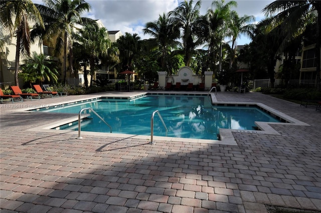 view of pool featuring a patio