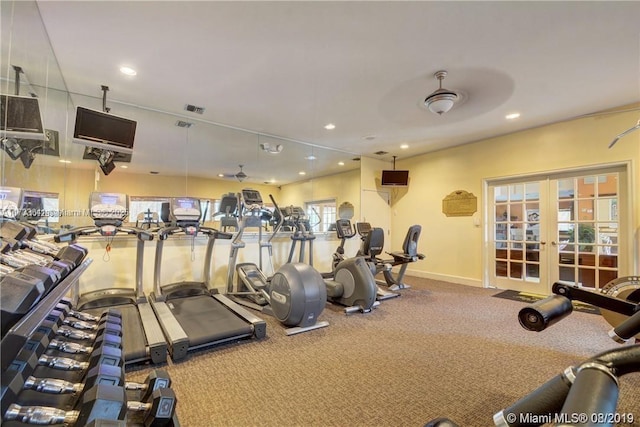 workout area featuring carpet, ceiling fan, and french doors