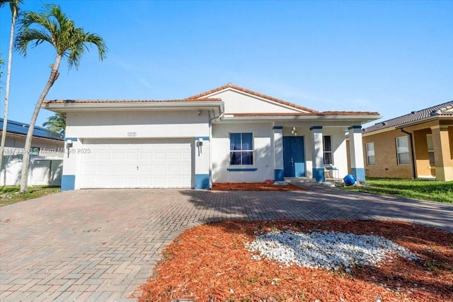 view of front of home with a garage