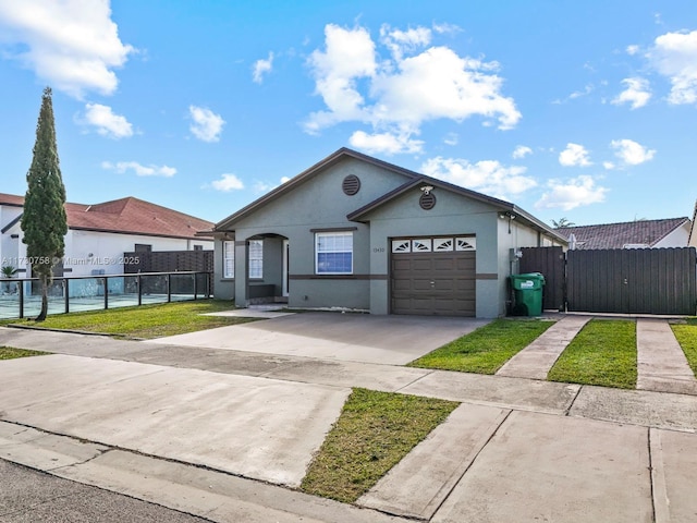 ranch-style home featuring a garage