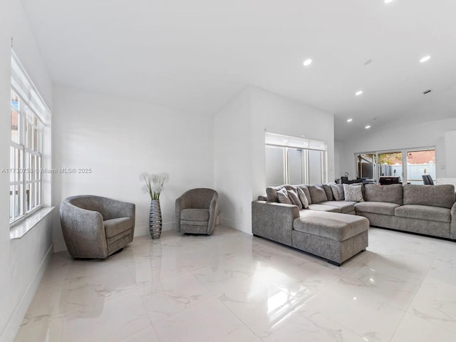 living room with vaulted ceiling