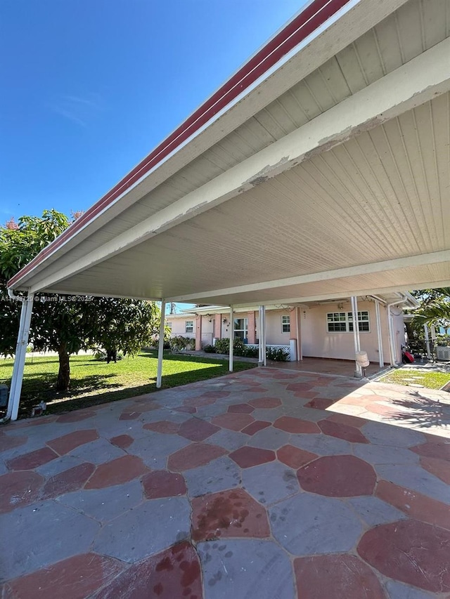 view of patio featuring a carport