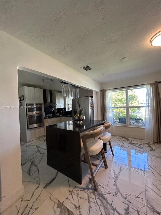 living room with a textured ceiling