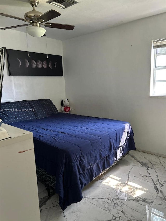 bedroom featuring ceiling fan