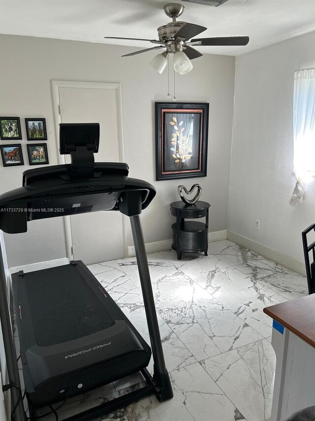 workout room featuring ceiling fan