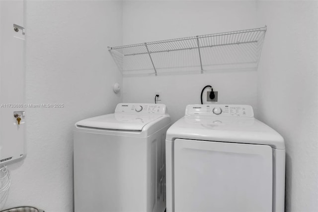 laundry area featuring independent washer and dryer