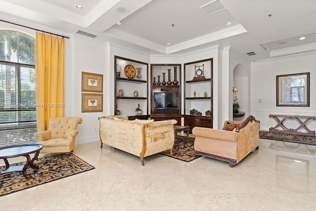 living room featuring crown molding and built in features