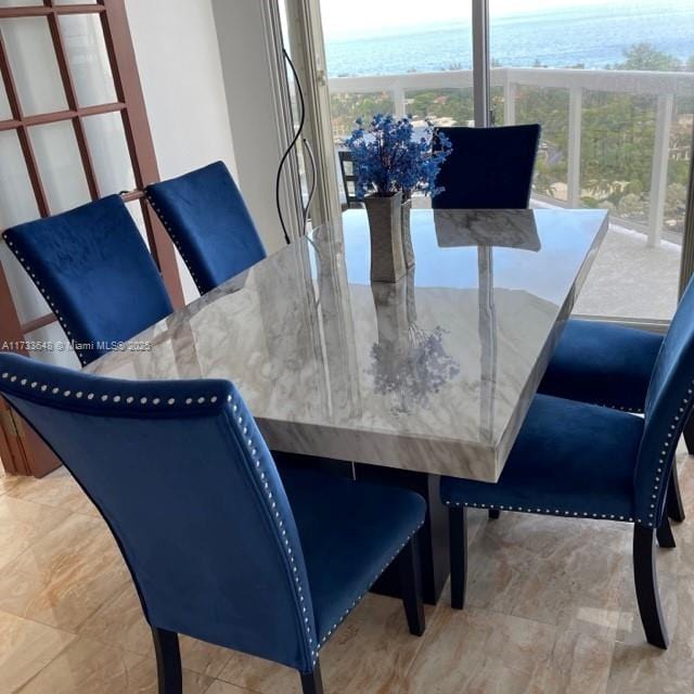 dining room with a water view