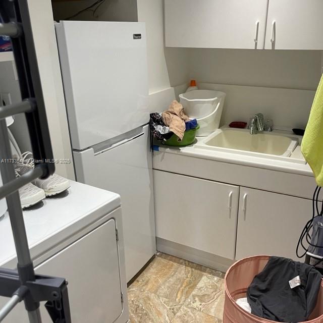 laundry room featuring sink