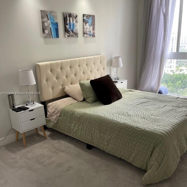 bedroom featuring carpet flooring