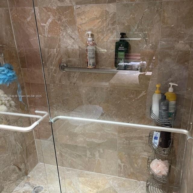 room details with a shower with shower door