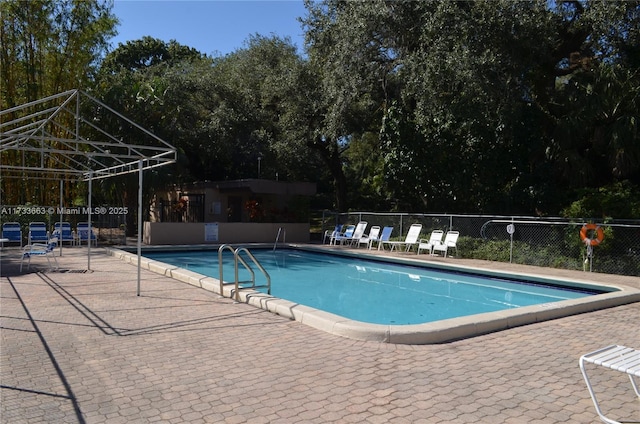 view of pool featuring a patio and a gazebo