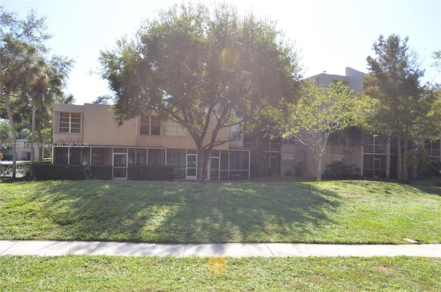 exterior space featuring a front lawn