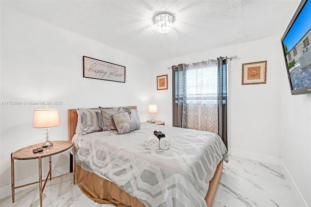 bedroom with a textured ceiling