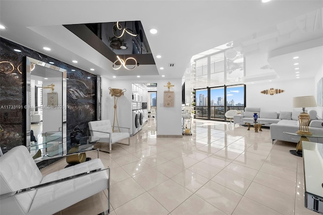 19667 Turnberry Way Unit 20B, Aventura, FL 33180 - community lobby featuring washer / clothes dryer and recessed lighting