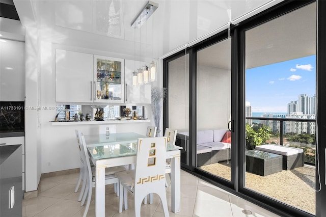 19667 Turnberry Way Unit 20B, Aventura, FL 33180 - dining area with light tile patterned flooring, a view of city, and bar