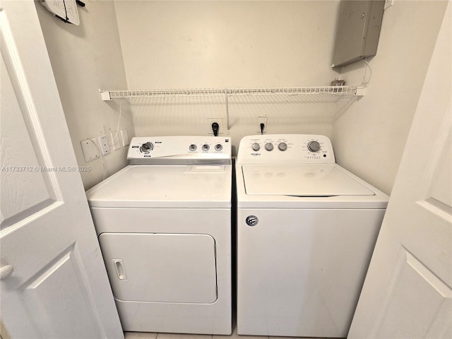 washroom with independent washer and dryer