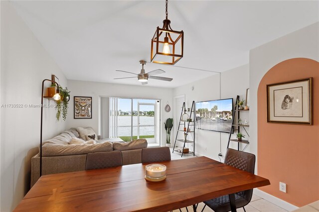 kitchen with white cabinetry, appliances with stainless steel finishes, sink, and light tile patterned floors