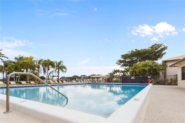 pool featuring fence