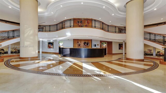 reception area featuring decorative columns