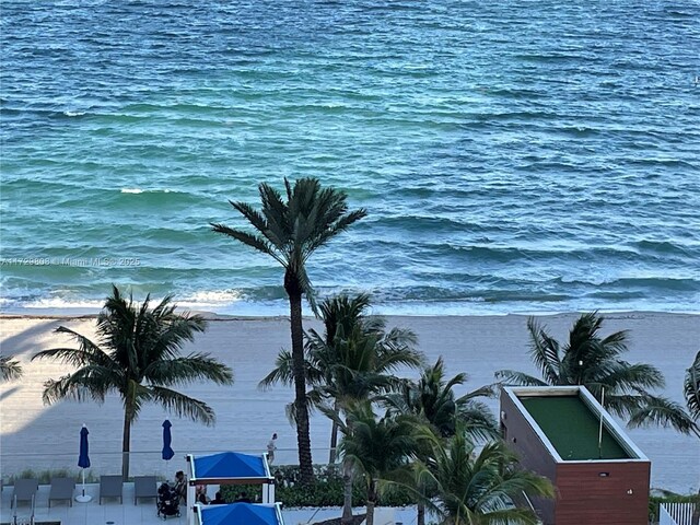 view of water feature with a beach view