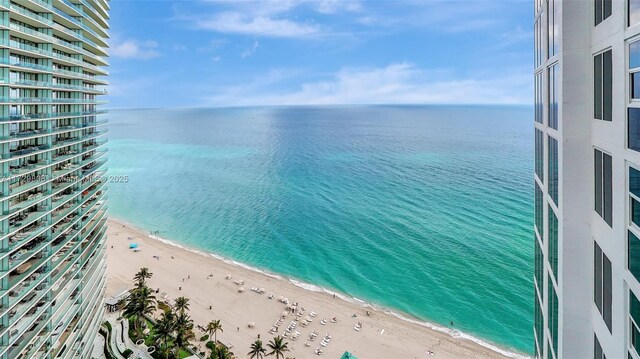 water view featuring a beach view