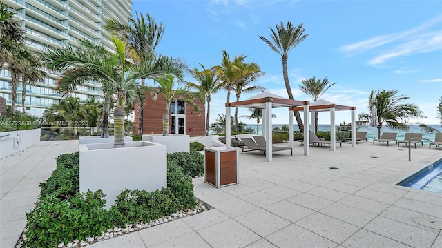 surrounding community with a patio