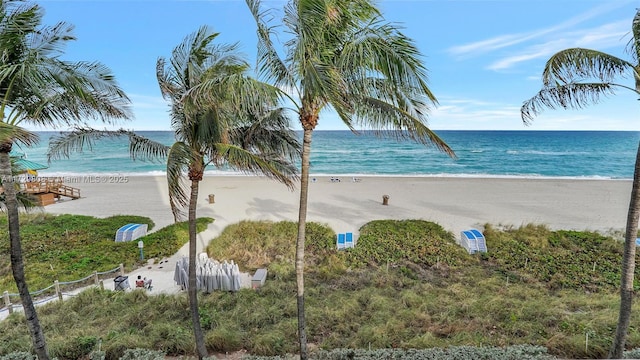 view of water feature with a beach view